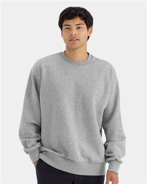 Next Level - Sudadera unisex de cuello redondo y peso pesado - 9007