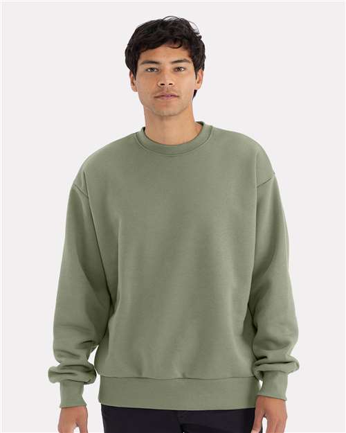 Next Level - Sudadera unisex de cuello redondo y peso pesado - 9007