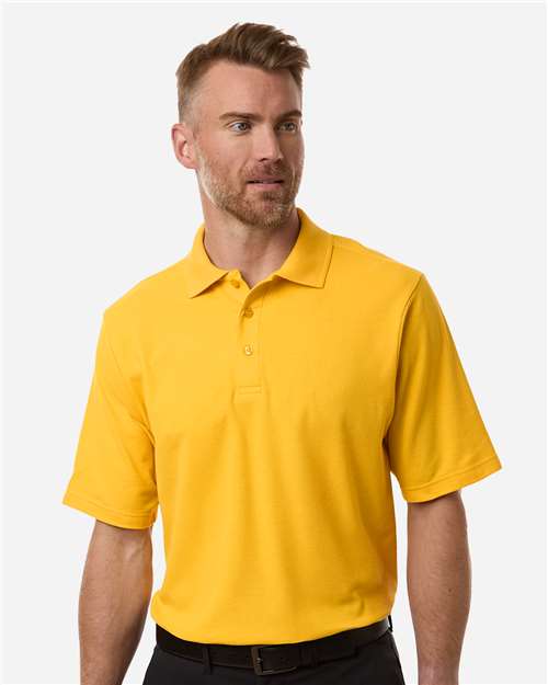 CORE365 - Polo de piqué de alto rendimiento Resolve CVC para hombre - CE106
