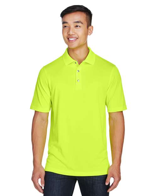 Harriton - Polo Advantage Snag Protection Plus IL con tapeta a presión para hombre - M345